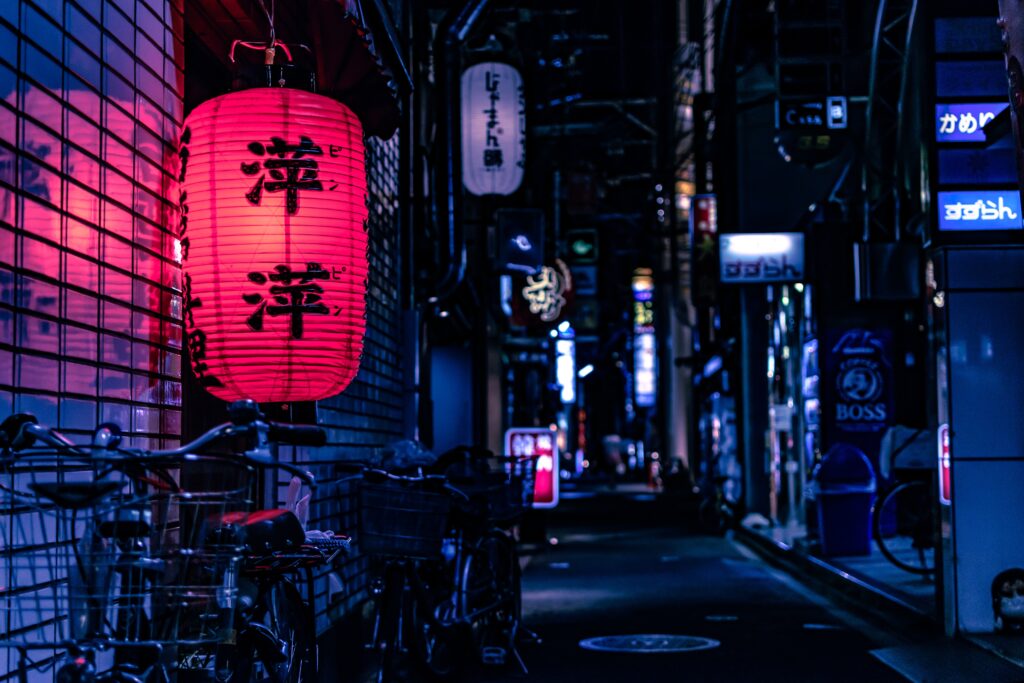 Night city street and light  latern adorned with japanese words