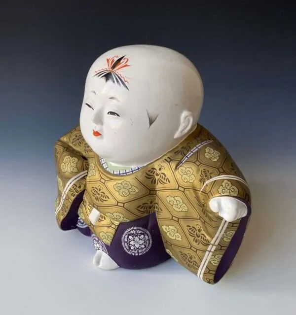 33 Best Things to Buy in Tokyo: Souvenirs, Fashion, Snacks & Hidden Gems 35 Traditional Japanese doll (Ningyo)