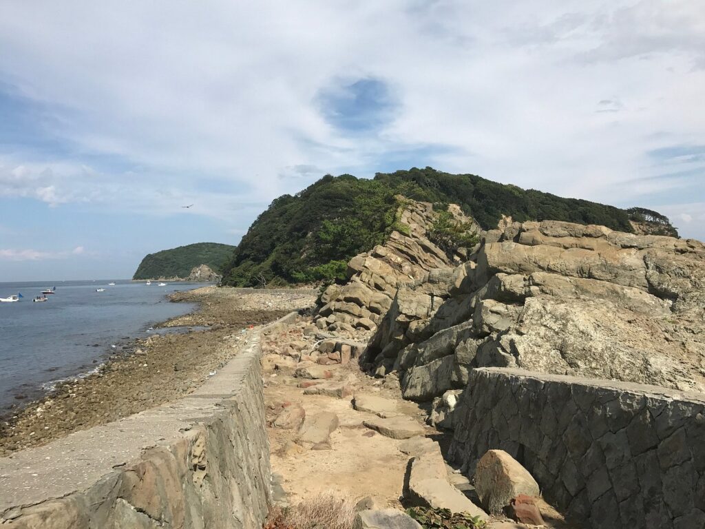Anime Pilgrimage Japan: A Deep Dive into 48 Sacred Anime Locations Across Japan 13 The Seawall Along Tsutsumi River