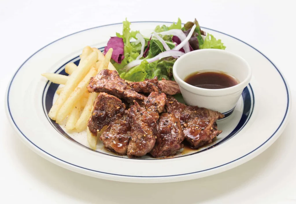 Where To Eat At Tokyo Station (2026): 20 Best Lunch Spots 14 Grilled meat with fries and salad