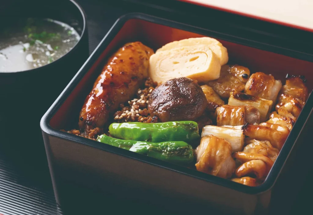 Where To Eat At Tokyo Station (2026): 20 Best Lunch Spots 16 Japanese bento box with grilled items