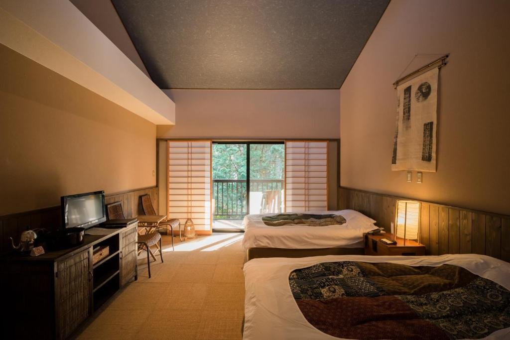 Guest room at Shimanto Inn overlooking peaceful natural scenery