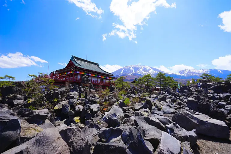 Black lava rock landscape at Onioshidashien Park near Mount Asama in Gunma