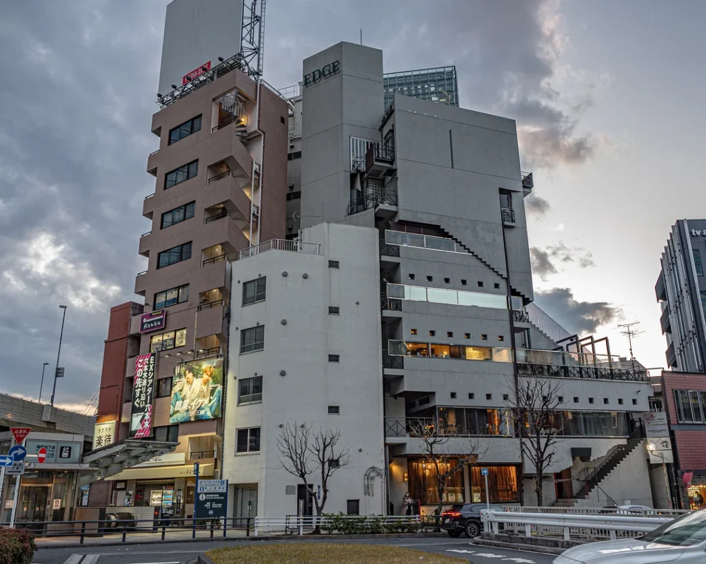 Tower House in Tokyo, a narrow exposed-concrete residence designed by Takamitsu Azuma