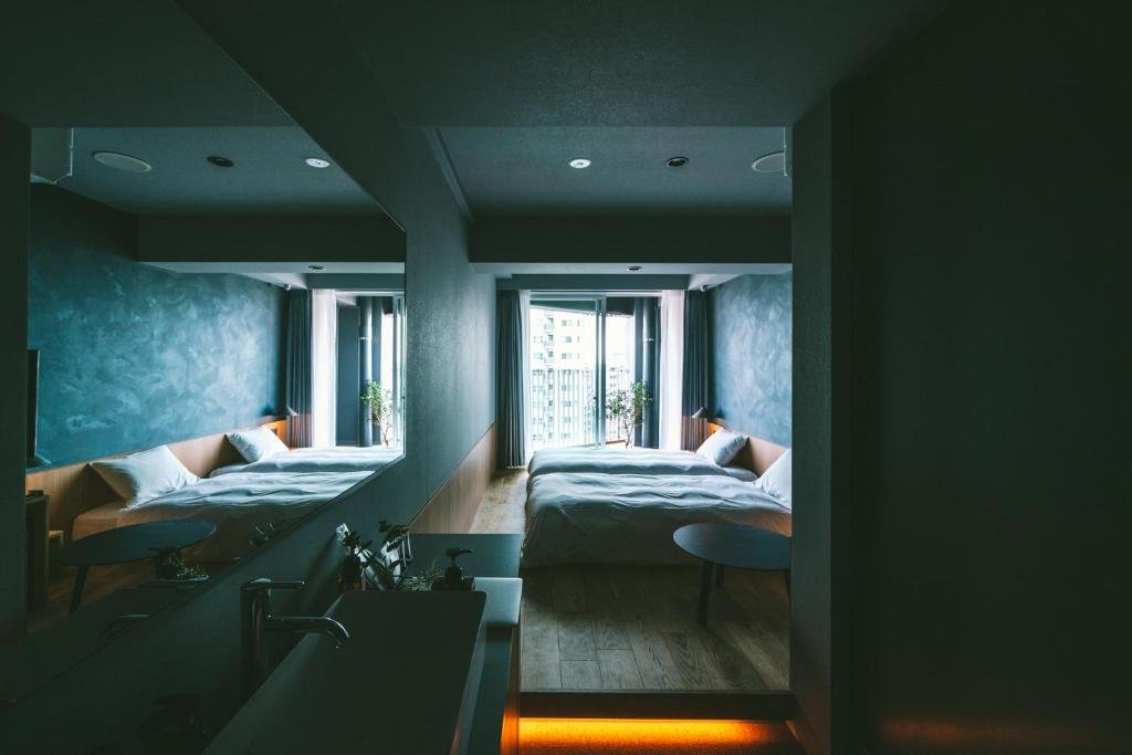 Relaxed interior at LANDABOUT TOKYO with simple stylish design for budget-conscious couples