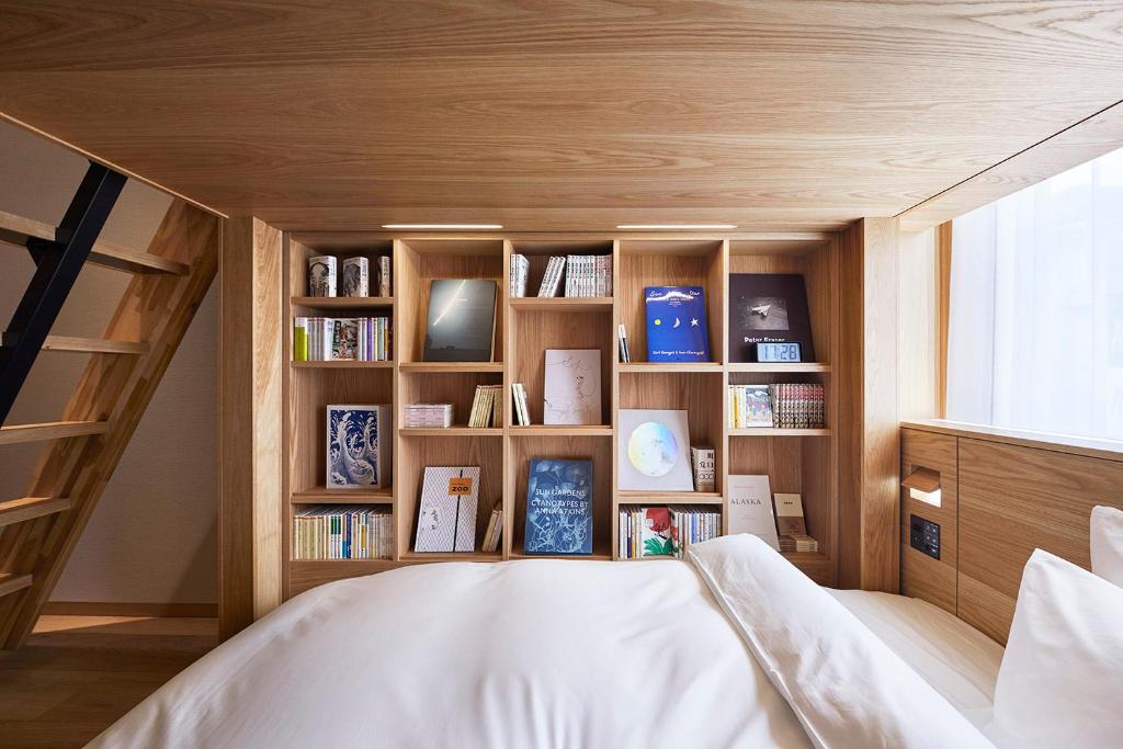 Unique Hotels in Tokyo (2026): 11 Cool, Wonderful, and Unforgettable Places to Stay 15 MUJI Hotel Ginza minimalist guest room with natural wood design