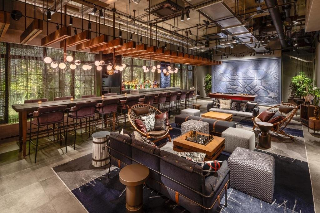 Stylish lounge and social space at The Lively Tokyo Azabujuban for couples staying in central Tokyo