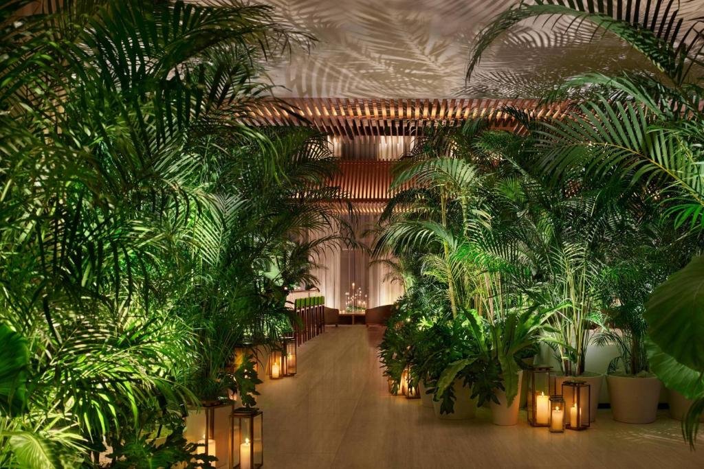 The Tokyo EDITION Toranomon lobby and greenery with Tokyo Tower views