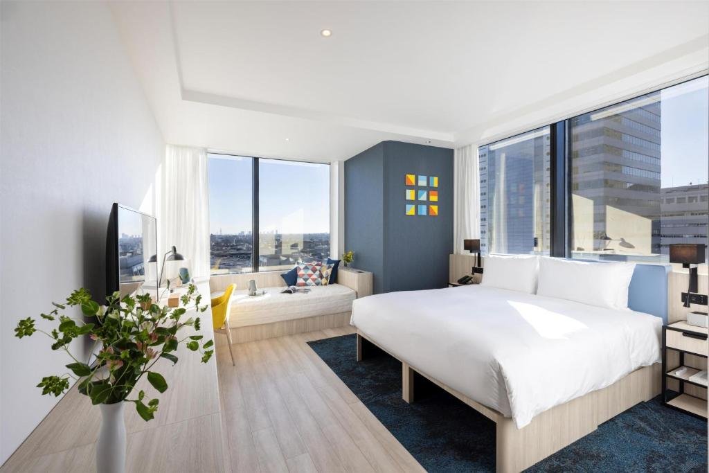 Hyatt House Tokyo Shibuya spacious room with kitchen and living area