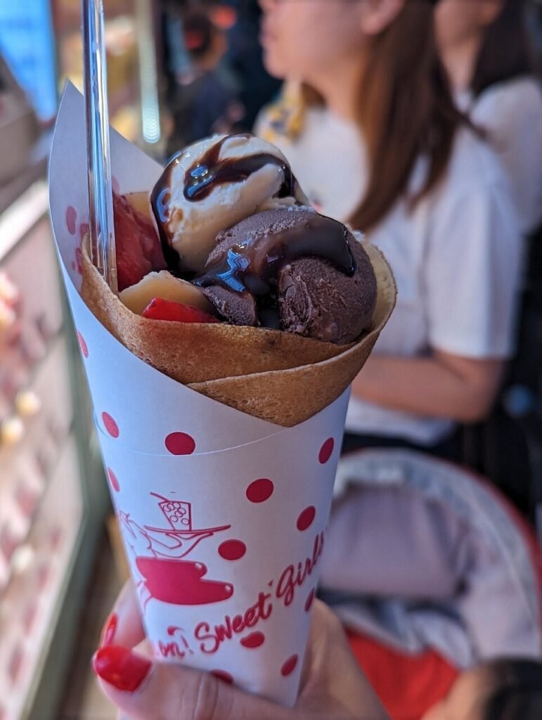 What to Do in Harajuku With Kids (2026): 19 Fun, Cute & Easy Tokyo Ideas 9 Marion Crepes Harajuku Takeshita Street sweet crepe with cream and fruit