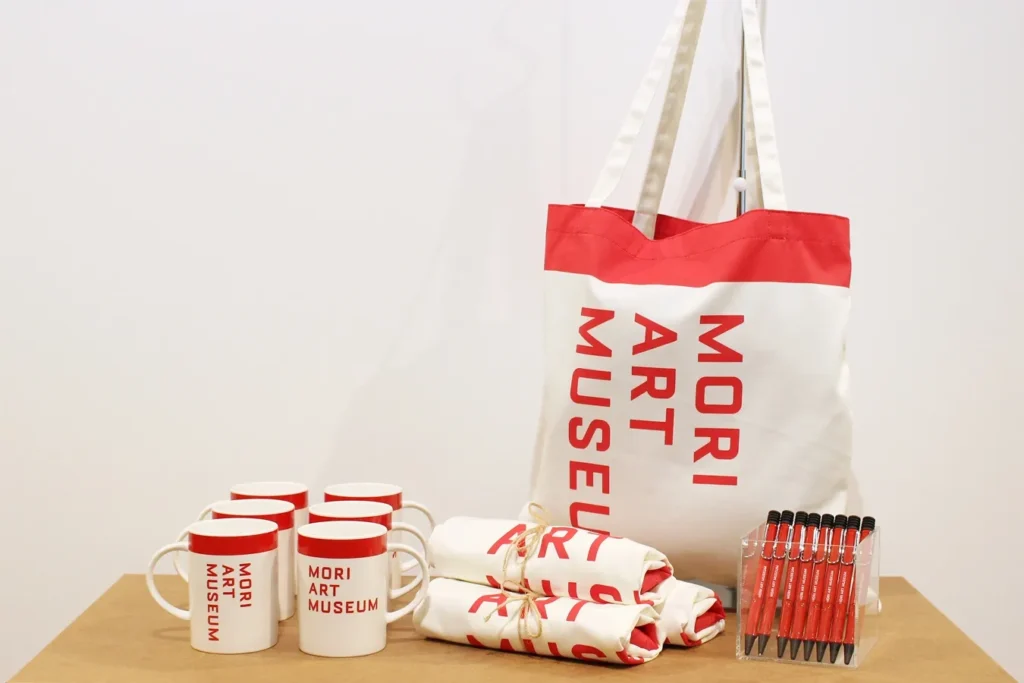 23 Most Unique Stores in Tokyo (2026): Sweets, Character Goods and Tokyo-Only Gifts 22 Mori Art Museum original tote bag and mug souvenirs