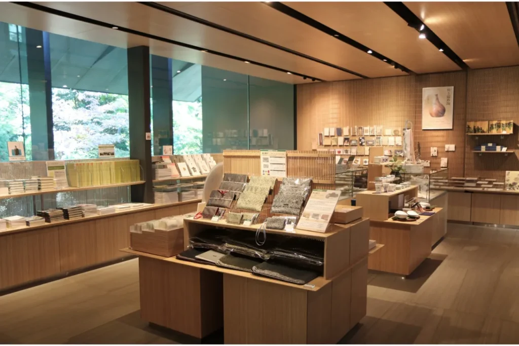 23 Most Unique Stores in Tokyo (2026): Sweets, Character Goods and Tokyo-Only Gifts 27 Nezu Museum Shop interior overlooking the museum garden