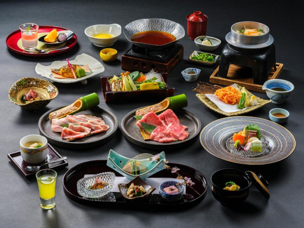 Kaiseki dinner at Mizu no Oto with grilled meat, seafood, rice, tempura, and small seasonal dishes