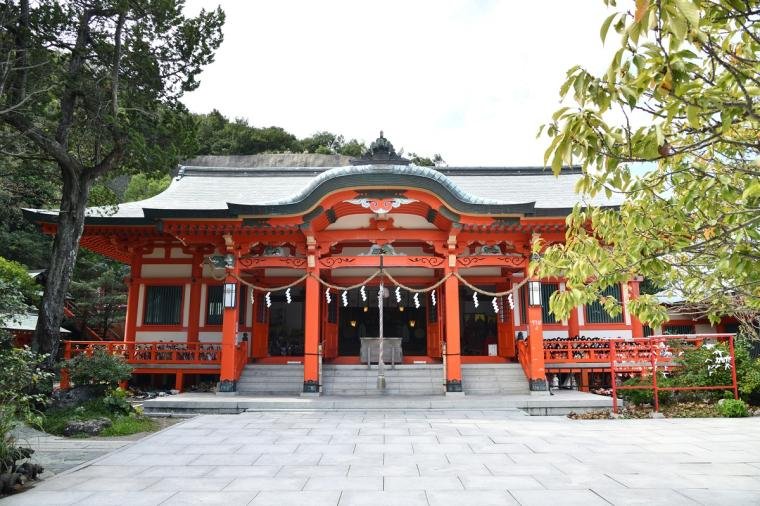 Rows of dolls and shrine buildings at Awashima Shrine in Kada Wakayama