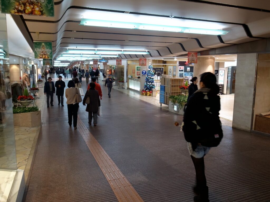 Best Shopping in Kobe Japan (2026): 25 Spots- Malls, Markets & Hidden Shops 10 Shoppers walking through the Santica underground shopping arcade in Sannomiya