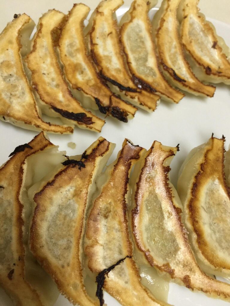 Where to Eat in Kobe (2026): 21 Best Places for Kobe beef, sushi & local food 27 Pan-fried gyoza served with miso dipping sauce at Akaman Motomachi