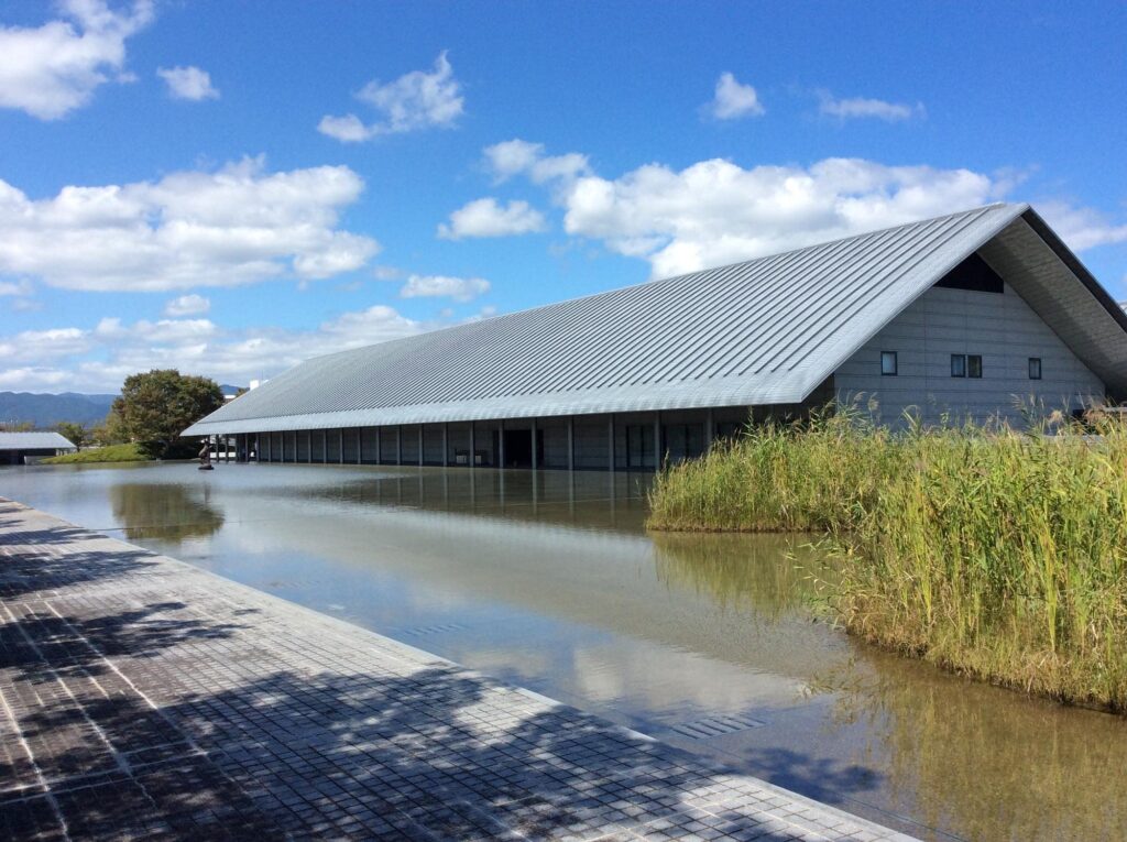 20 Best Things to Do in Shiga (2026): Lake Biwa, Castles, Shrines and More 18 Sagawa Art Museum reflected in its water garden beside Lake Biwa