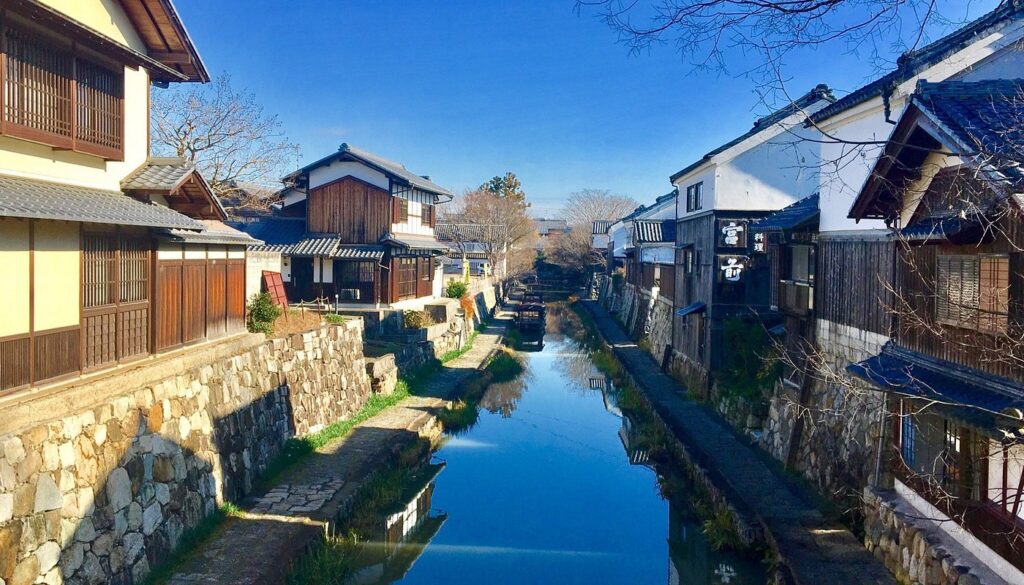 20 Best Things to Do in Shiga (2026): Lake Biwa, Castles, Shrines and More 16 Hachimanbori Canal lined with traditional merchant houses in Omihachiman