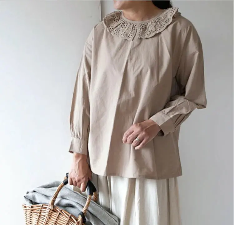 Mori Girl outfit featuring decorative romantic details such as lace and embroidery